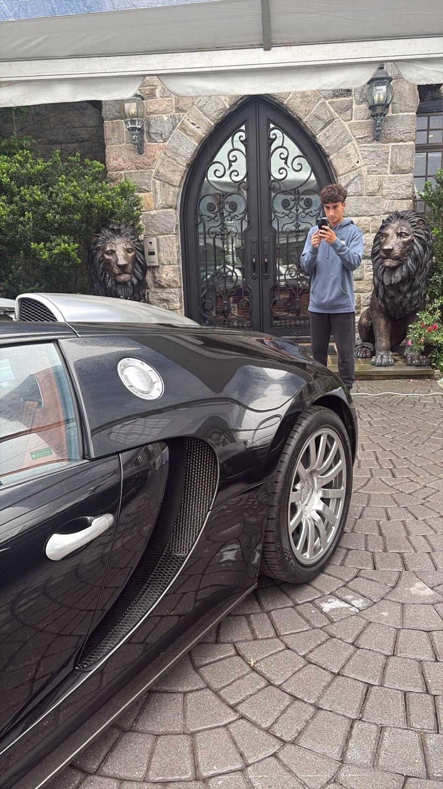 Jacob photographing a sports car