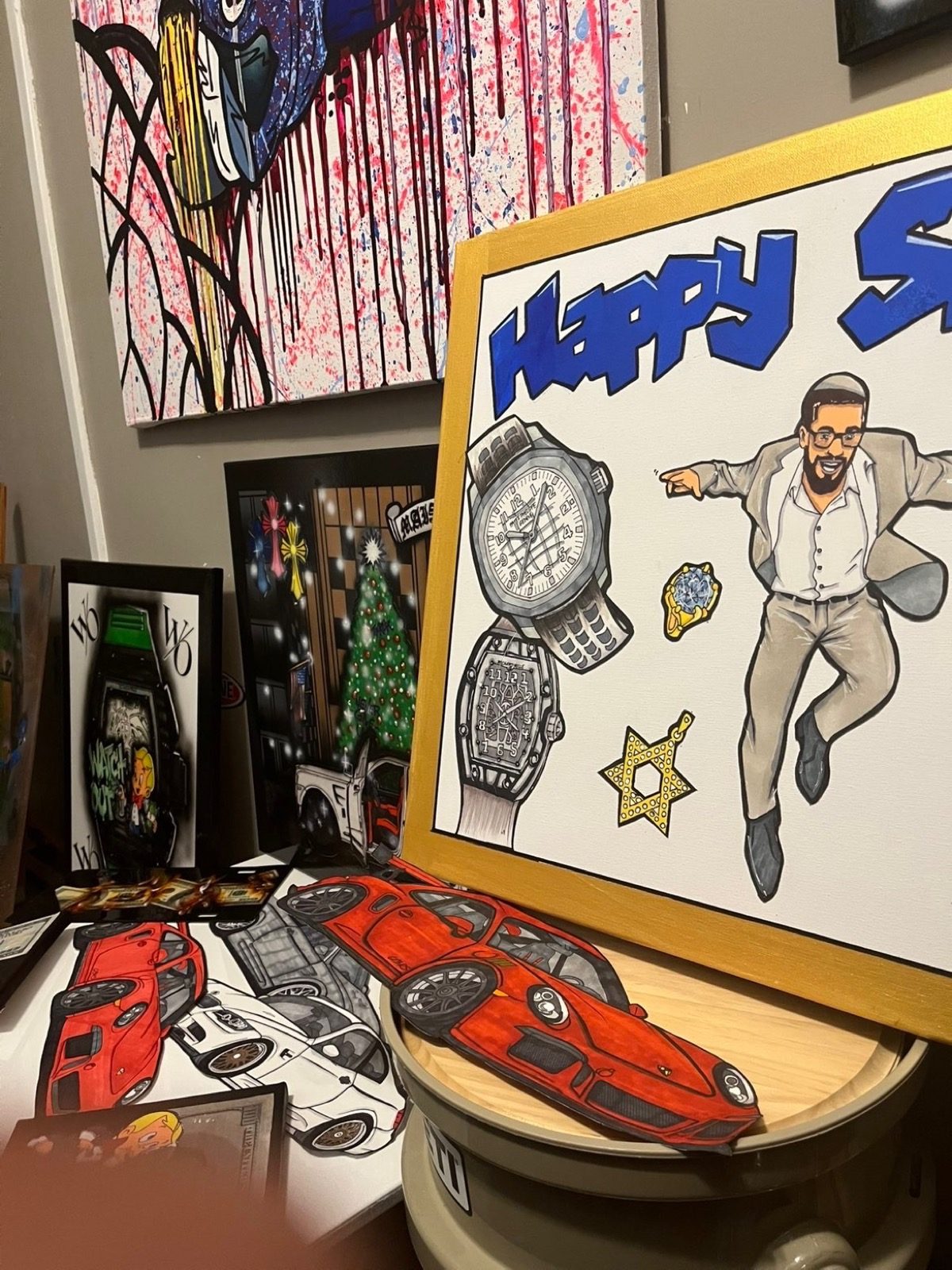 Custom portrait artwork with luxury watches in a gold frame
